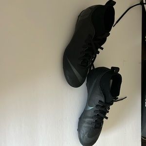 Black Nike soccer cleats